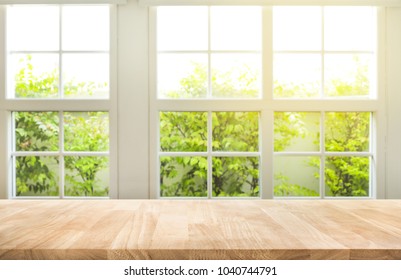 Top of wood table counter on blur window view garden background.For montage product display or design key visual layout - Shutterstock ID 1040744791
