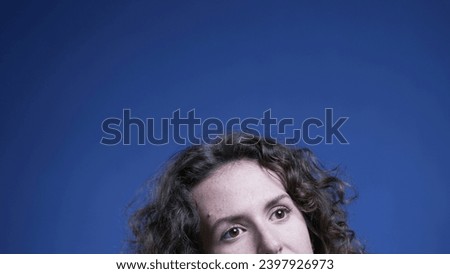 Similar – a woman lies on a green sofa. resting.