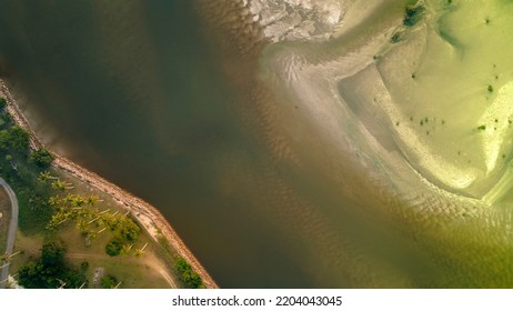 Top-down Drone View Of Rapids Of Mountain River With Wet Boulders And Pebble Shore.