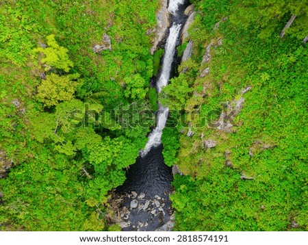 Topdown drone view of Siringo Waterfall and river stream at Silalahi in Dairi, Sumatera Utara, Indonesia
