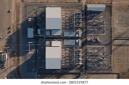 Top-down image of a high-voltage electrical substation, a critical component of energy infrastructure.