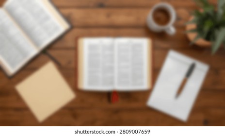 A top-down perspective shows an open book, a notebook with a pen, and a cup of coffee on a rustic wooden surface, suggesting a scene of learning or contemplation.