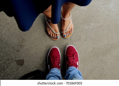 Top-Down View of Couple's Feet