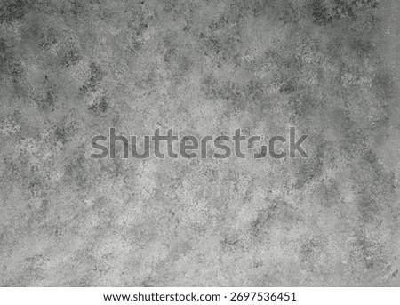 A top-down view of a light grey surface with a subtle, interwoven fabric pattern and large, soft, mottled patches of lighter and darker tones, creating a gentle, abstract texture. Minimalist, elegant