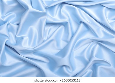 A top-down view of pastel blue flowy acetate satin, featuring glossy folds and a smooth, luxurious texture. Perfect for fashion, textile design, or elegant fabric showcases.