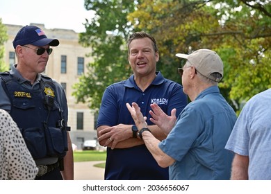 Topeka, Kansas, August 28, 2021
Former Kansas Secretary Of State Kris Kobach And Shawnee County Sheriff Brian Hill Speak With Elected Kansas State Representatives During The Patriots Freedom Rally