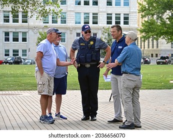 Topeka, Kansas, August 28, 2021
Former Kansas Secretary Of State Kris Kobach And Shawnee County Sheriff Brian Hill Speak With Elected Kansas State Representatives During The Patriots Freedom Rally