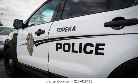 Topeka, Kansas - May 22, 2022: Topeka Police logo on cop car