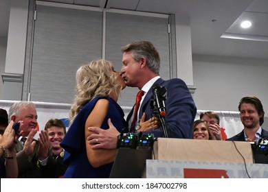 Topeka, Kansas, USA, November 3, 2020 
Republican Congressman Dr. Roger Marshall Kisses His Wife Laina Marshall As They Celebrate His Election Victory Over Dr. Barbara Bollier For The Senate Seat 