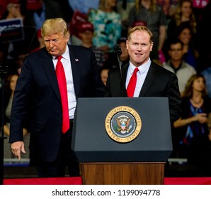 Topeka Kansas, USA, October 6, 2018
Army Veteran And West Point Graduate Steve Watkins The Republican Candidate For Kansas's 2nd Congressional District Is Escorted To The Podium By President Trump