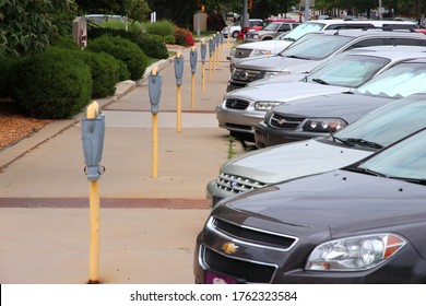 TOPEKA, USA - JUNE 25, 2013: Parking meters in Topeka, Kansas, United States. Topeka is the capital city of the State of Kansas and is the 4th biggest populated area in Kansas.