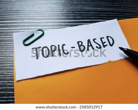 Topic - based writting on table background.