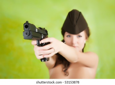 Topless Women Shooting Guns