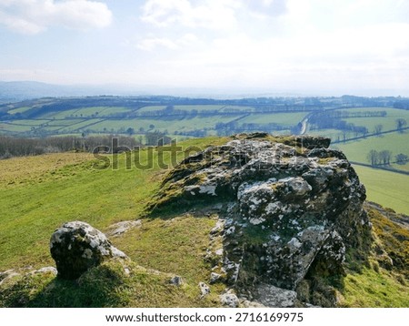 A Tor on Dartmoor in Devon made from volcanic breccia and pillow lavas and surmounted by the Church of St. Michael with views over Dartmoor National Park