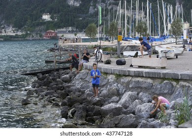 Torbole, Italy - August 12, 2015: Sailboats in a marina at Lake Garda in Torbole  - Shutterstock ID 437747128