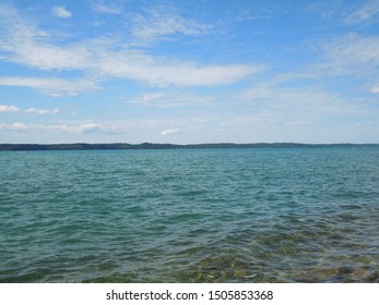 Torch Lake Under Blue Sky