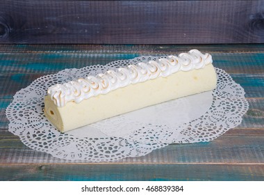 torched merengue biscuit cake roll with exotic marmalade - Shutterstock ID 468839384