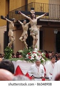 TORDESILLAS, SPAIN - APRIL 22: Holy week processionist and altar servers accompany Christ in the Tordesillas procession on April 22, 2011 in Tordesillas,Valladolid (Spain)