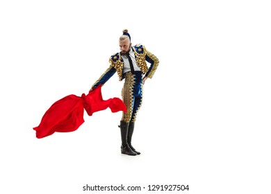 Torero in blue and gold suit or typical spanish bullfighter isolated over white studio background. The taming, achieving the goal, mortification, conquest, boss, leadership, battle, win, winner - Powered by Shutterstock