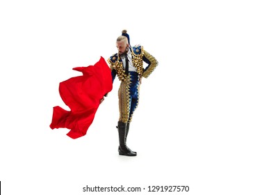 Torero in blue and gold suit or typical spanish bullfighter isolated over white studio background. The taming, achieving the goal, mortification, conquest, boss, leadership, battle, win, winner - Powered by Shutterstock