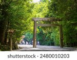 Tori gate at The Grand Shrine of Ise or Ise Jingu Naiku, Inner Sanctuary in the natural green scenery background, Ise City, Mie., Japan