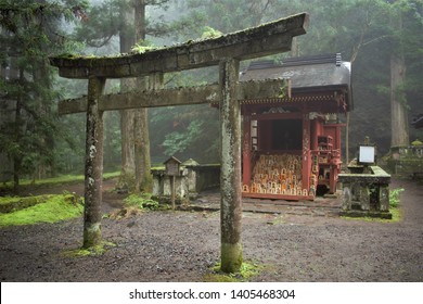 Torii in front of Kannon-do with small wooden Shogi blocks (inscription kyosha 香車, lance), Nikko, Japan