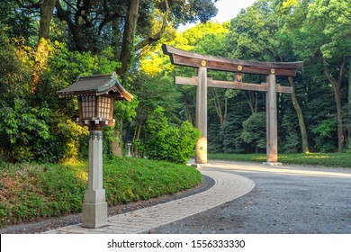 Torii gate leading to the Meiji Shrine complex. Meiji Shrine (Meiji Jingu) is a Shinto shrine that is dedicated to the deified spirits of Emperor Meiji and his wife, Empress Shoken, Tokyo, Japan