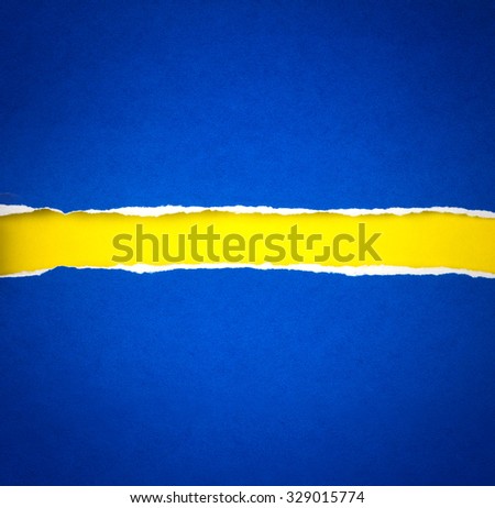 Torn blue Paper and space for text with a  yellow paper background
