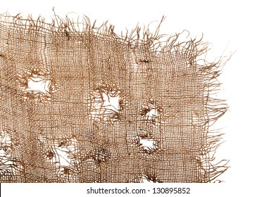 Torn Burlap Decayed. Ragged Linen Fabric. The Isolation Of Each Cell Between Threads.