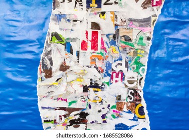 Torn And Crumpled Blue Glossy Paper Poster On Colorful Collage From Clippings With Letters And Numbers Texture Background. 