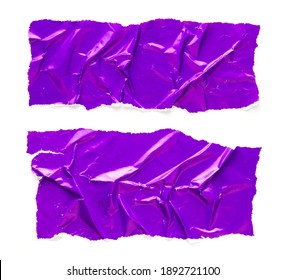 Torn And Crumpled Pieces Of Purple Glossy Magazine Paper Isolated On White Background. Ripped And Creased Purple Paper. Copy Space For Text.