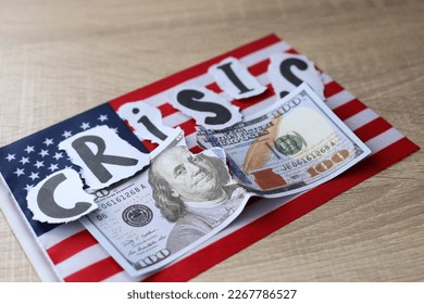 Torn dollar bill with American flag. Debt ceiling, stock market and financial concept. - Shutterstock ID 2267786527