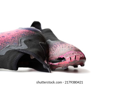 Torn Football Boot Close Up Isolated On White Background As A Mockup With Copy Space. Worn Old Football Boots