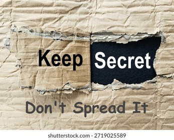 Torn gray box layer written keep secret don't spread it art represents the responsibility of keeping any secret entrusted to keep it