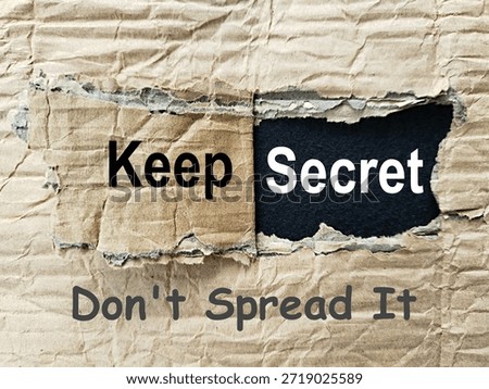 Torn gray box layer written keep secret don't spread it art represents the responsibility of keeping any secret entrusted to keep it