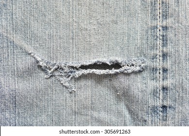  Torn jeans closeup