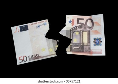 torn note fifty euro on black background