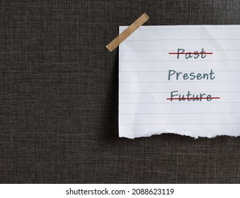 Torn note paper on dark background with text PAST PRESENT FUTURE, and choose PRESENT only, concept of living with present moment only, let go of past and not waiting for future