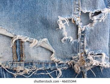 Torn Old Blue Jeans Background