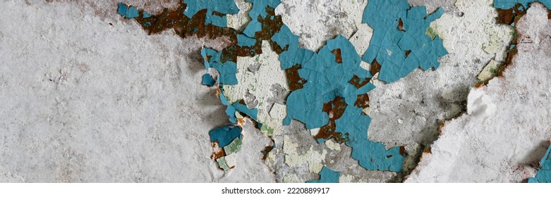 Torn Old Faded Paper Wallpaper On The Wall. Ragged Scraps Of White Paper On A Blue Background. Vintage Texture For Background And Design. Closeup View With Copy Space For Text.