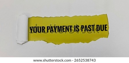 Torn paper with bold text reading 'Your Payment Is Past Due', symbolizing unpaid bills, financial warning, or overdue notice in personal or business context. 