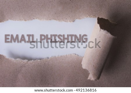 torn paper with EMAIL PHISING word. Copyspace area.