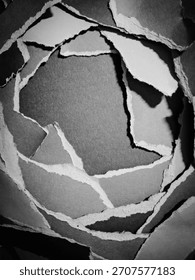 Torn paper layered in a circular shape