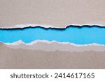 Torn paper on a blue background