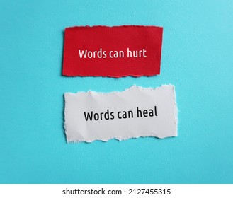 Torn paper on blue background with text Words can hurt , Words can heal - to remind language have power to harm or heal - word choice matters most so choose wisely - Shutterstock ID 2127455315