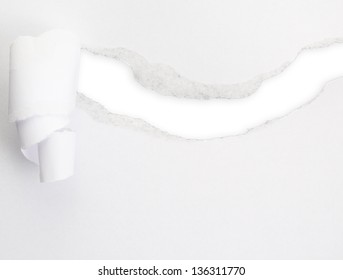 Torn paper sheet with an empty gap hole as a copyspace background