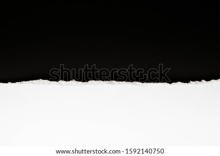 torn paper texture with black background