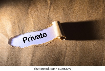 torn paper with word private