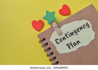 Torn paper written with text CONTINGENCY PLAN - Shutterstock ID 2096309095