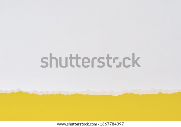 Torn ripped paper edge with copy space, white
and yellow color
background